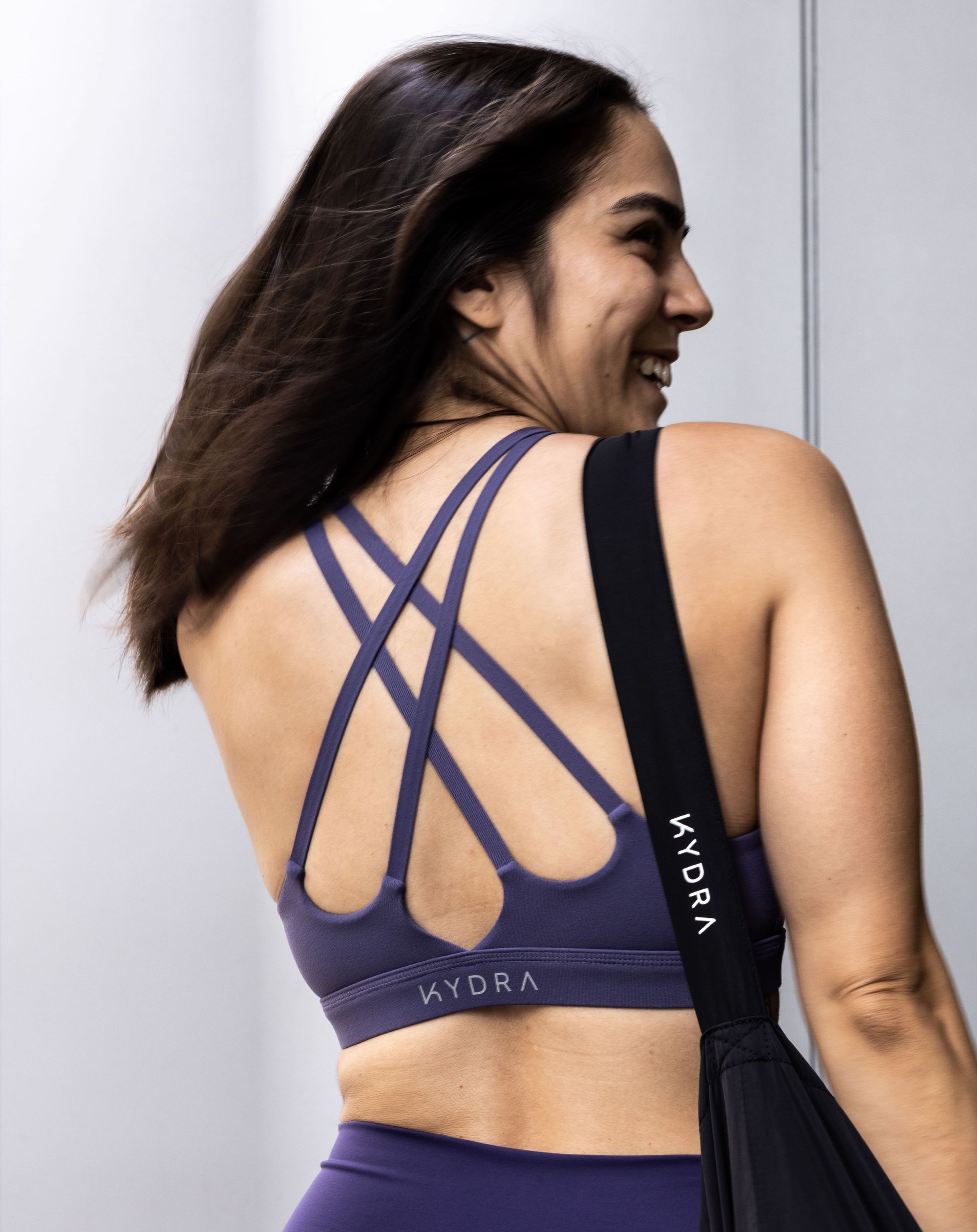 KYDRA apparel model smiling 