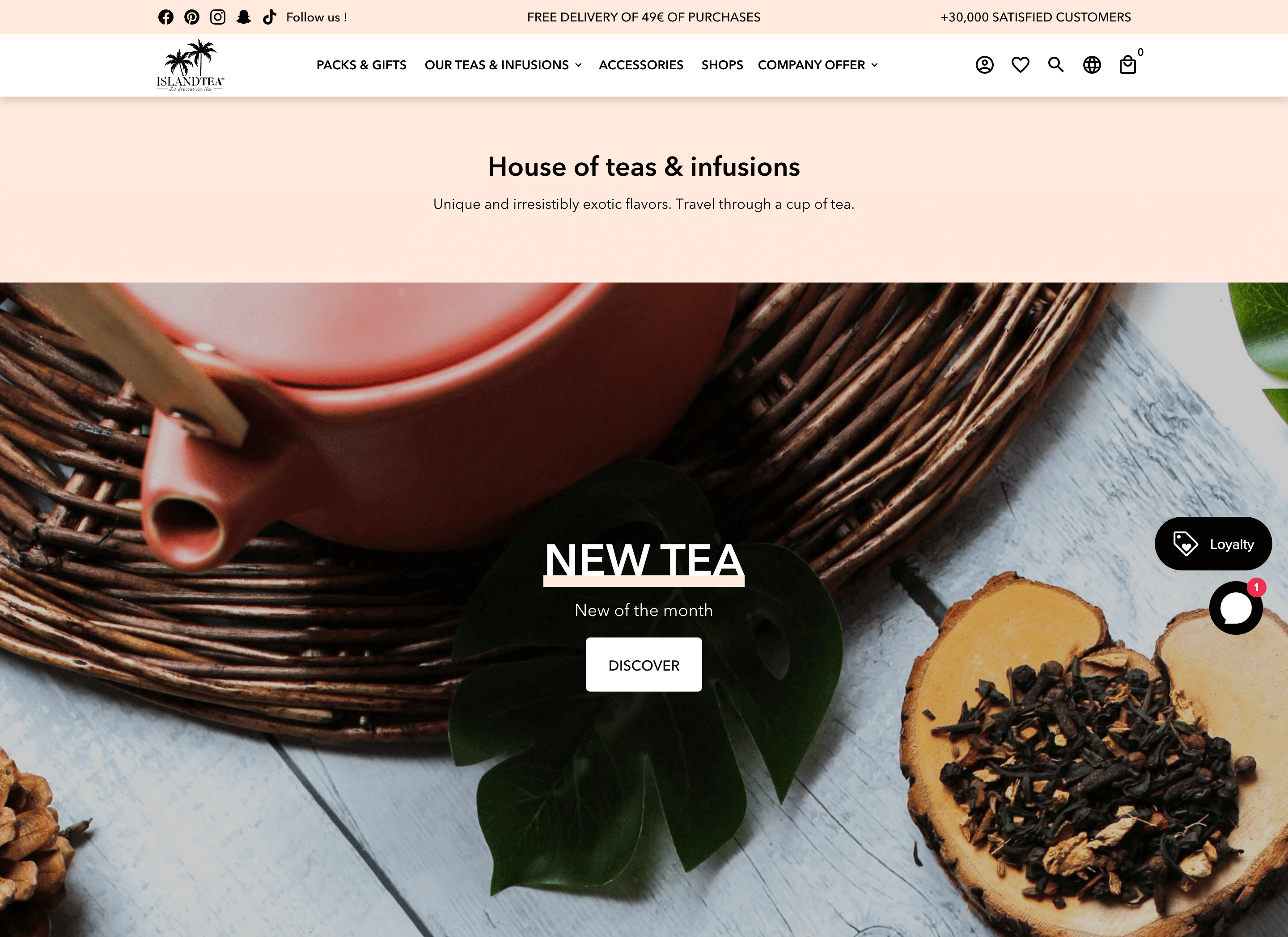 Women Ecommerce Entrepreneurs–A screenshot of Island Tea’s homepage. There is an image of a teapot, some wooden coasters, and various tea blends. 