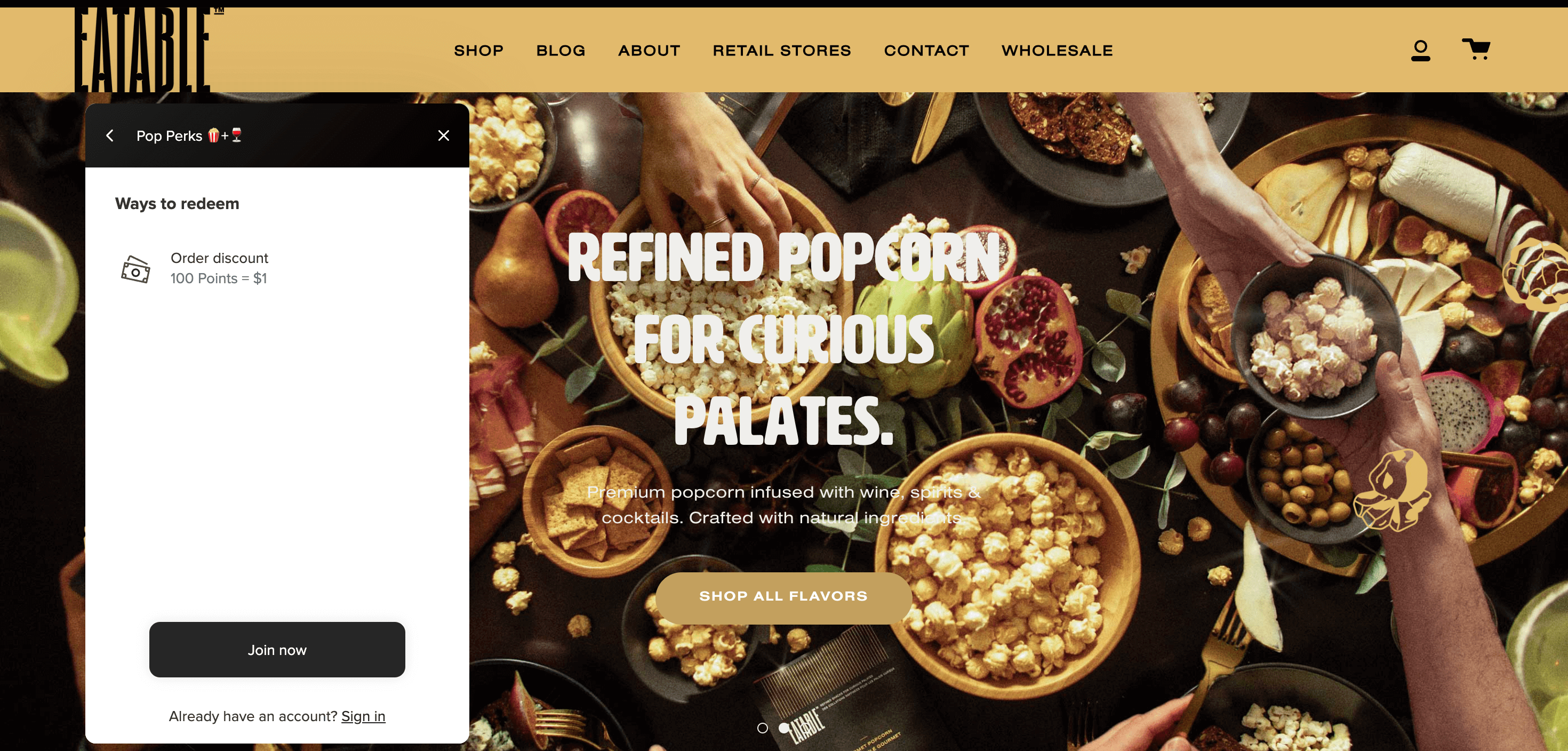 A screenshot of EATABLE Popcorn’s homepage with its rewards program panel on the left-hand side illustrating that 100 points = $1 off.
