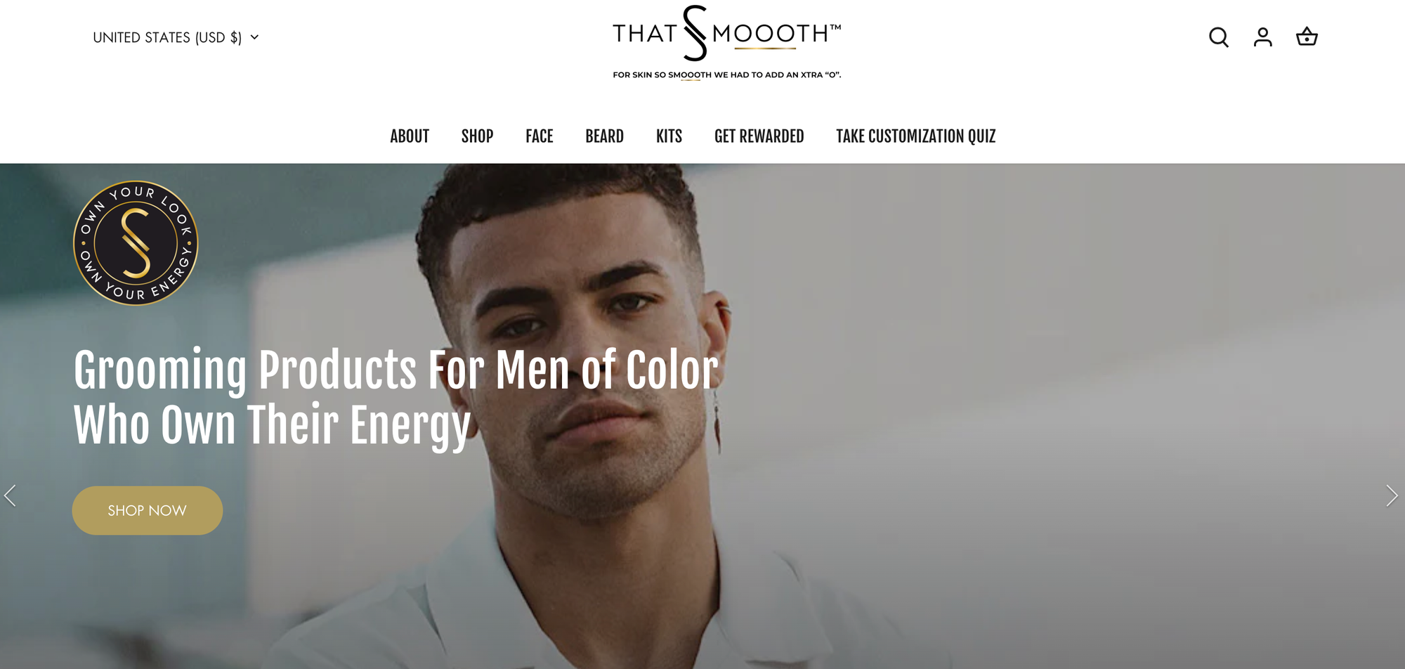 Support Black-owned businesses–A screenshot of That Smoooth’s homepage. The background image is a black-and-white headshot of a Black man. In front of that are white block letters that say, “Grooming products for men of color who own their energy. Shop”. 