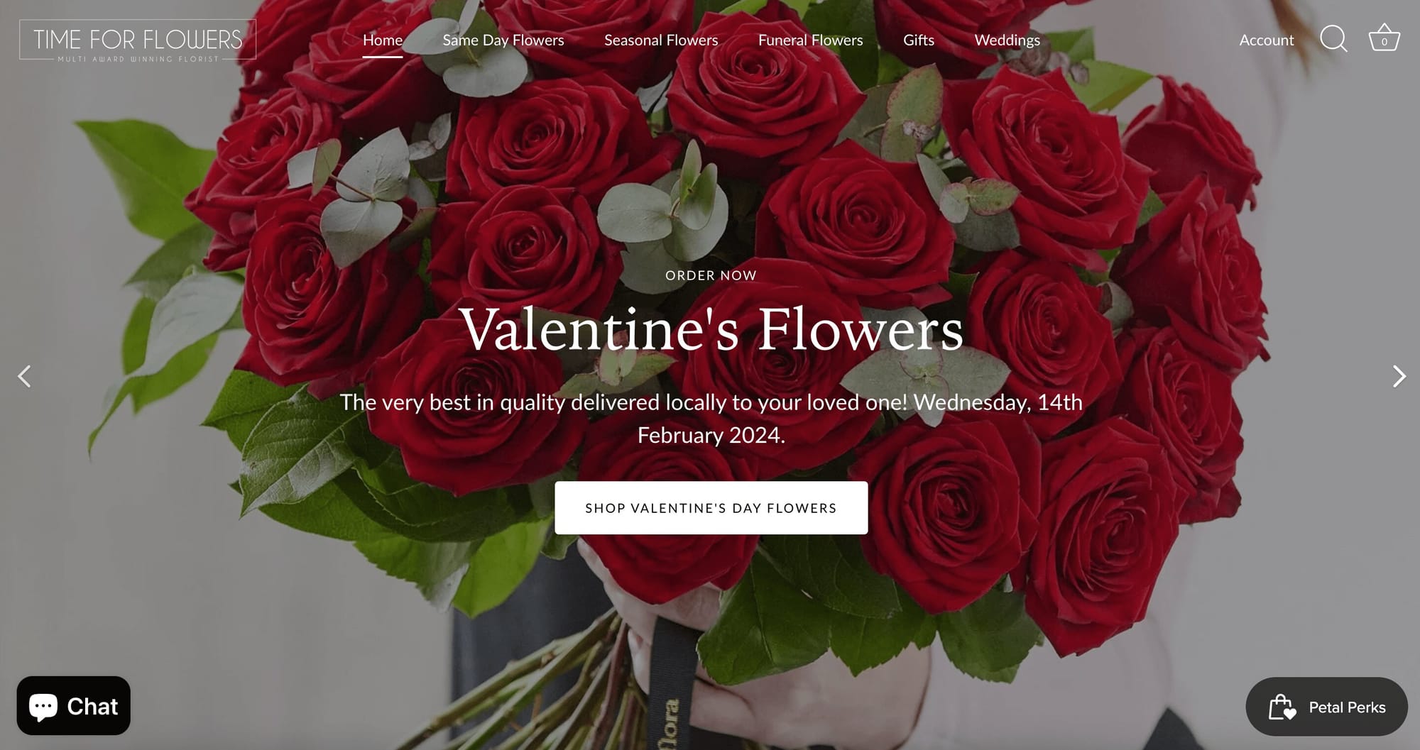 Valentine’s Day Gift Guide–A screenshot from Time For Flowers’ website homepage. The banner image features its Valentine’s Flowers collection and shows a bouquet of red roses. 